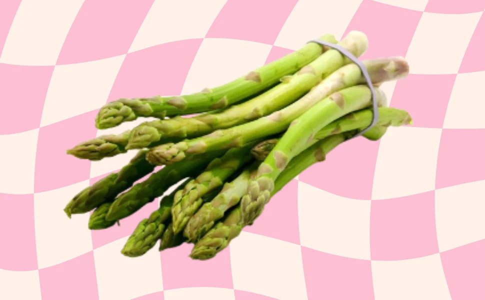 Fresh asparagus spears being blanched and frozen for long-term storage.